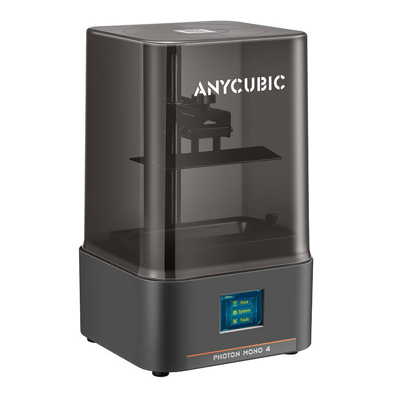Una stampante 3D Anycubic scura, modello Photon Mono 4, su una superficie bianca.