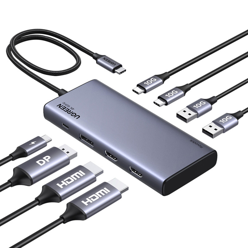 Hub USB-C Ugreen grigio con più cavi e porte collegati su sfondo bianco.
