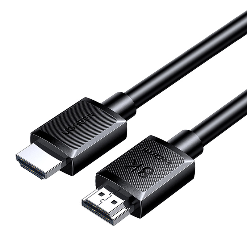 Due cavi HDMI neri con connettori metallici su sfondo scuro.