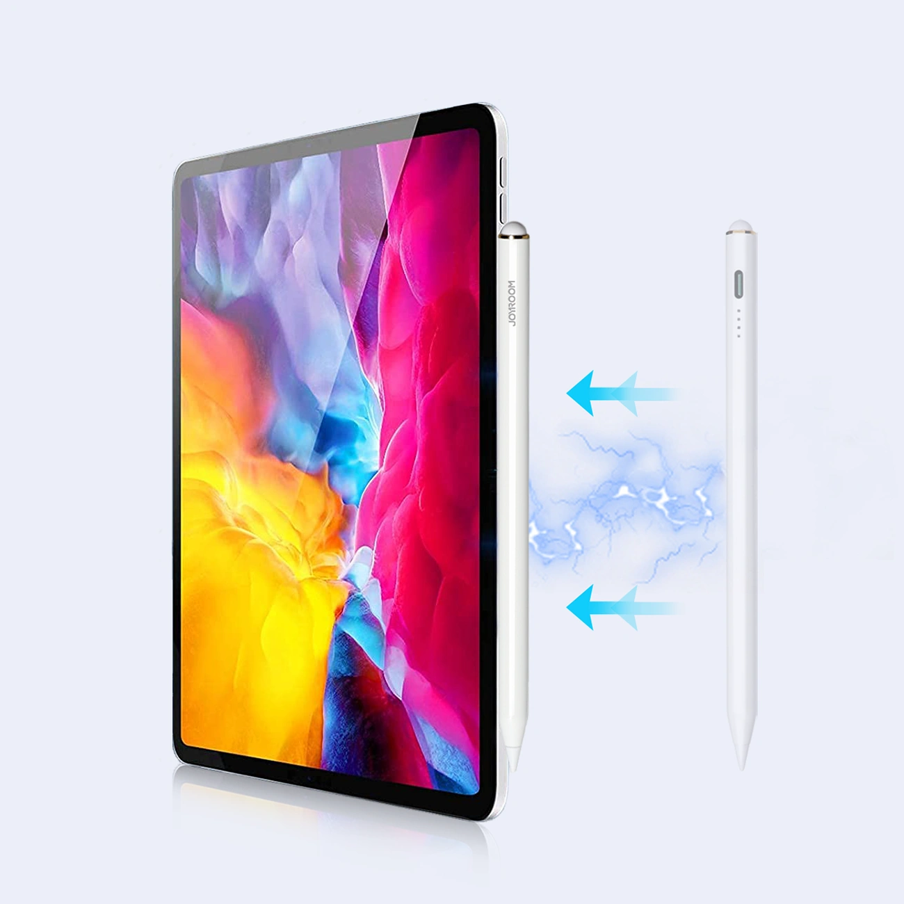 Un tablet con una penna stilo in carica magnetica, indicata da frecce blu e scintille.