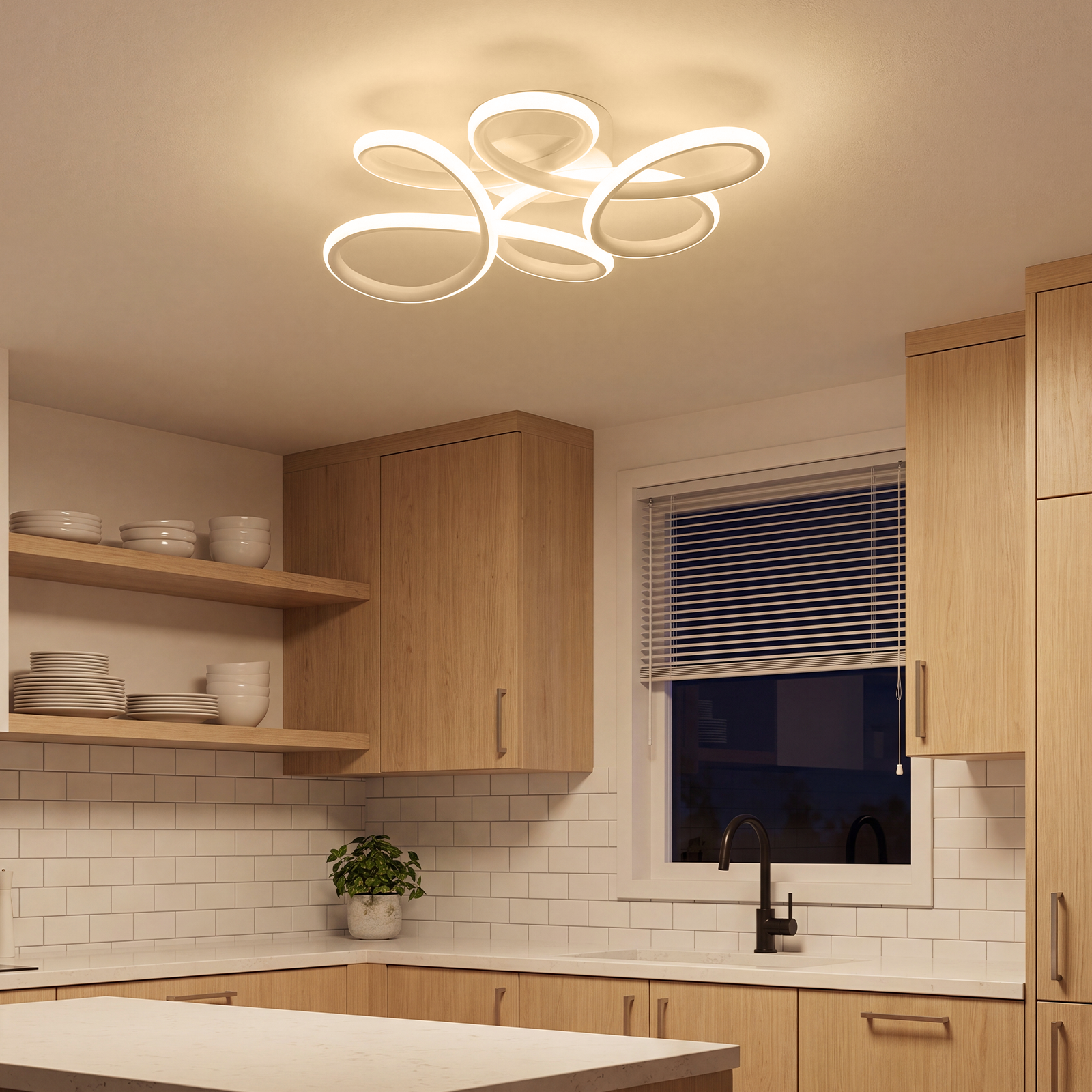 Una cocina moderna con armarios de madera, azulejos blancos y una lámpara de techo LED circular.