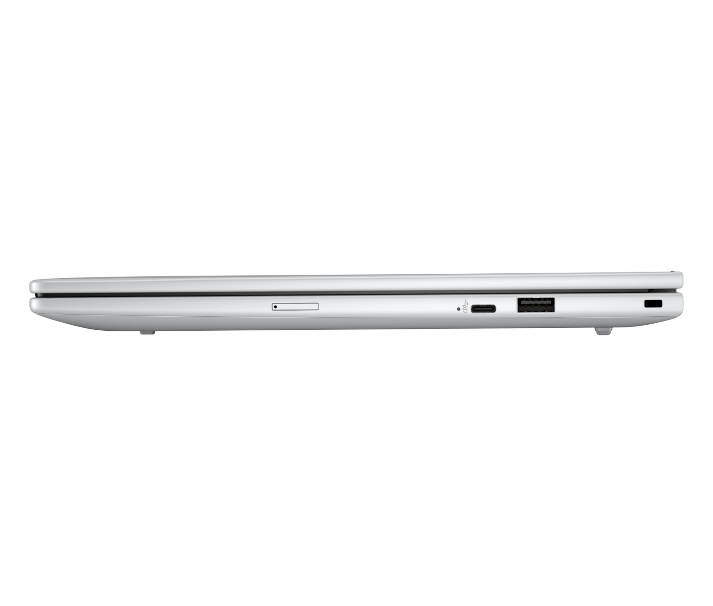 Vista lateral de una laptop plateada cerrada, mostrando puertos como USB-C y USB-A sobre fondo blanco.