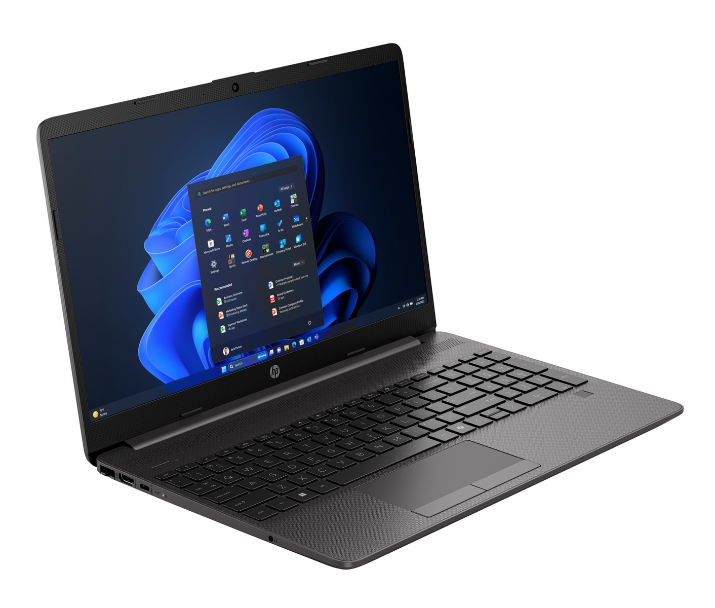 Un ordenador portátil gris abierto muestra el escritorio azul de Windows 11 sobre un fondo claro.