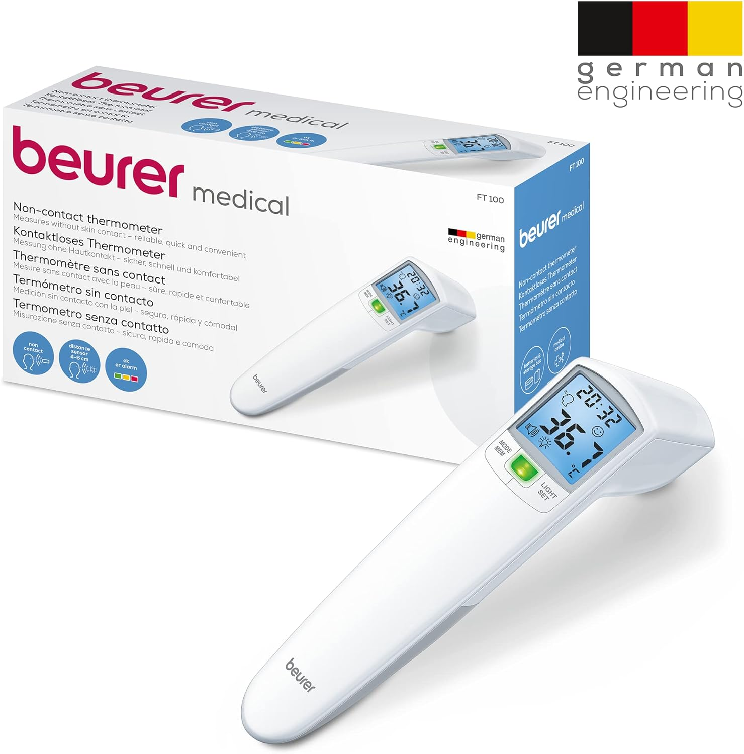 Ein weißes kontaktloses Beurer-Fieberthermometer vor seiner Produktverpackung.