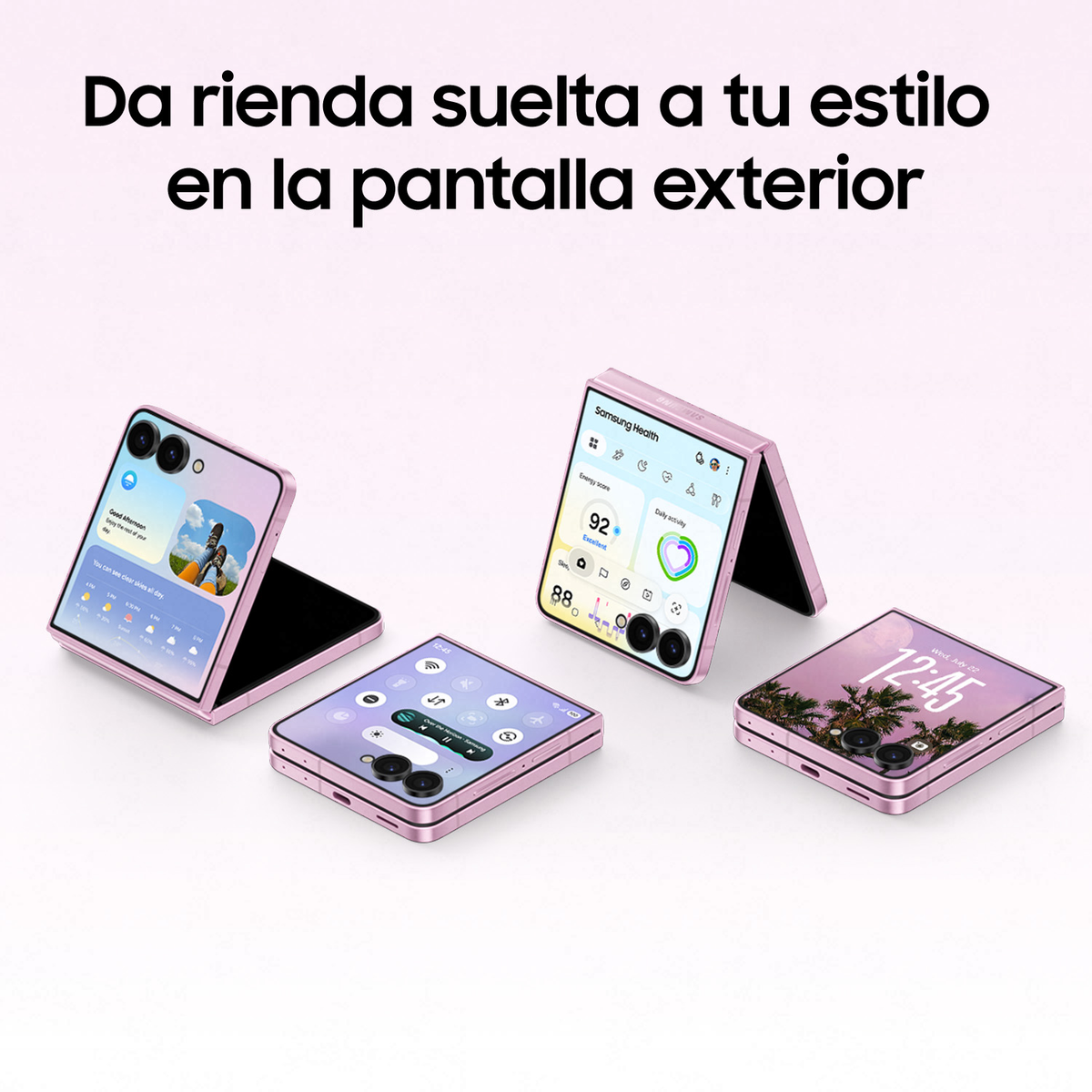 Quattro telefoni pieghevoli rosa con schermi esterni personalizzati su una superficie chiara.