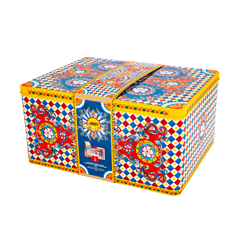 Scatola di latta decorativa colorata con motivo blu, rosso e bianco e bordo giallo.