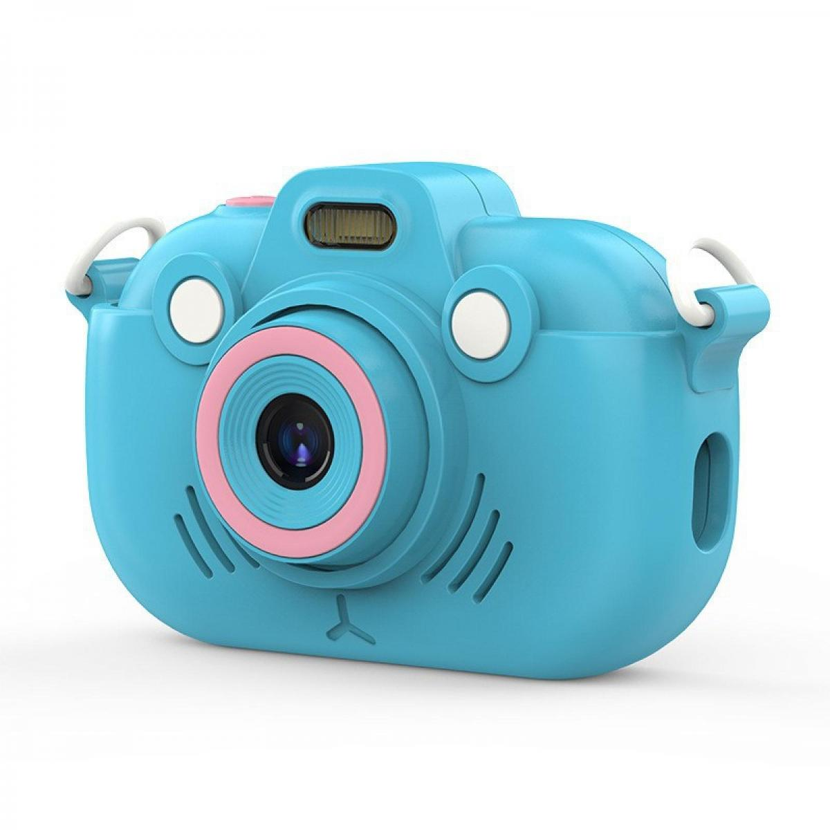 Eine blaue Kinderkamera mit rosa Linsenring und weißem Trageriemen vor weißem Hintergrund.