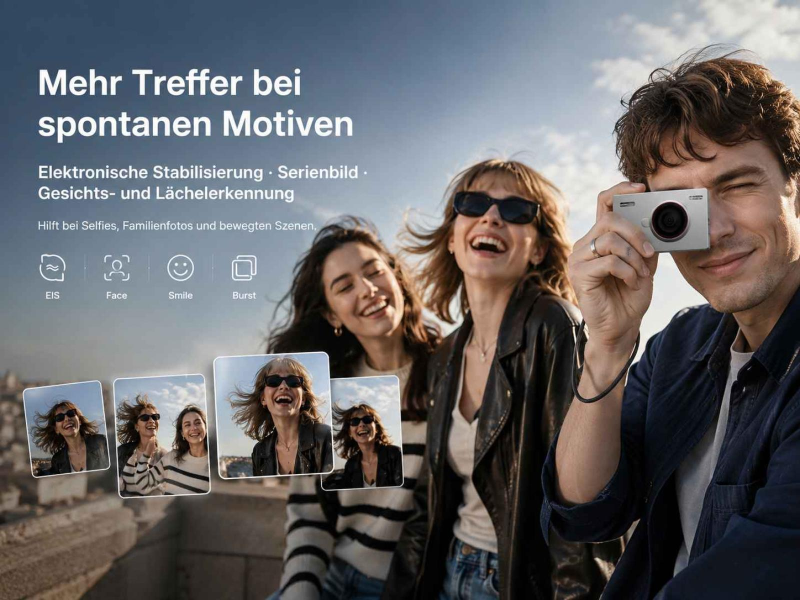 Drei junge Freunde lachen, während ein Mann im Freien vor blauen Himmel ein Foto mit einer kleinen Kamera macht.