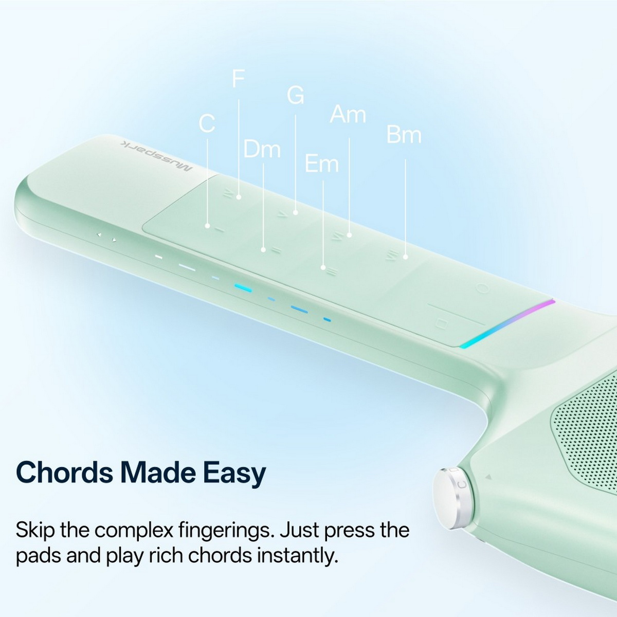 Ein hellgrünes Akkordlern-Gerät mit Akkordbeschriftungen an den Pads und dem Text Chords Made Easy.