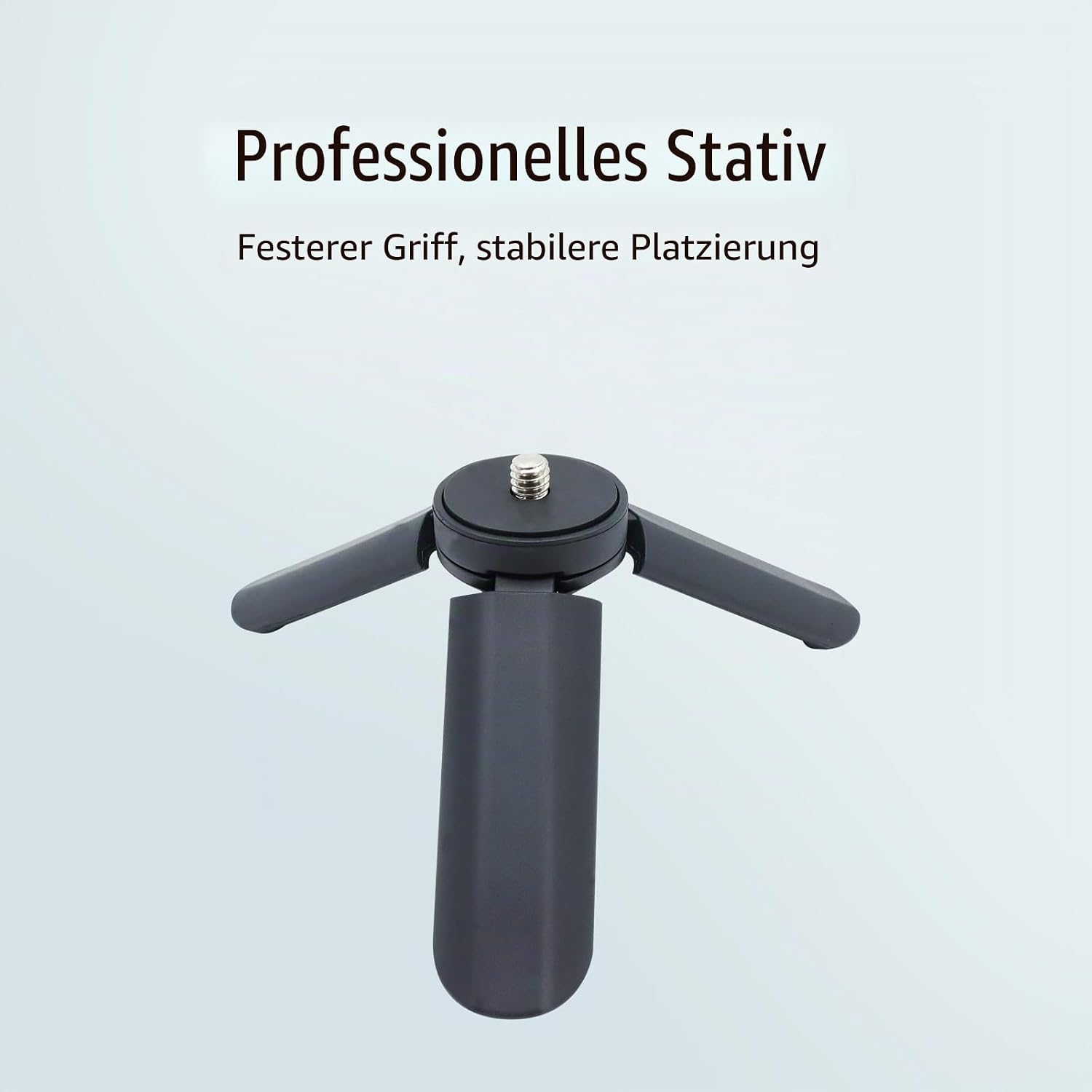 Ein schwarzes Mini-Stativ mit drei eingeklappten Beinen und einer Metallschraube auf hellem Hintergrund.