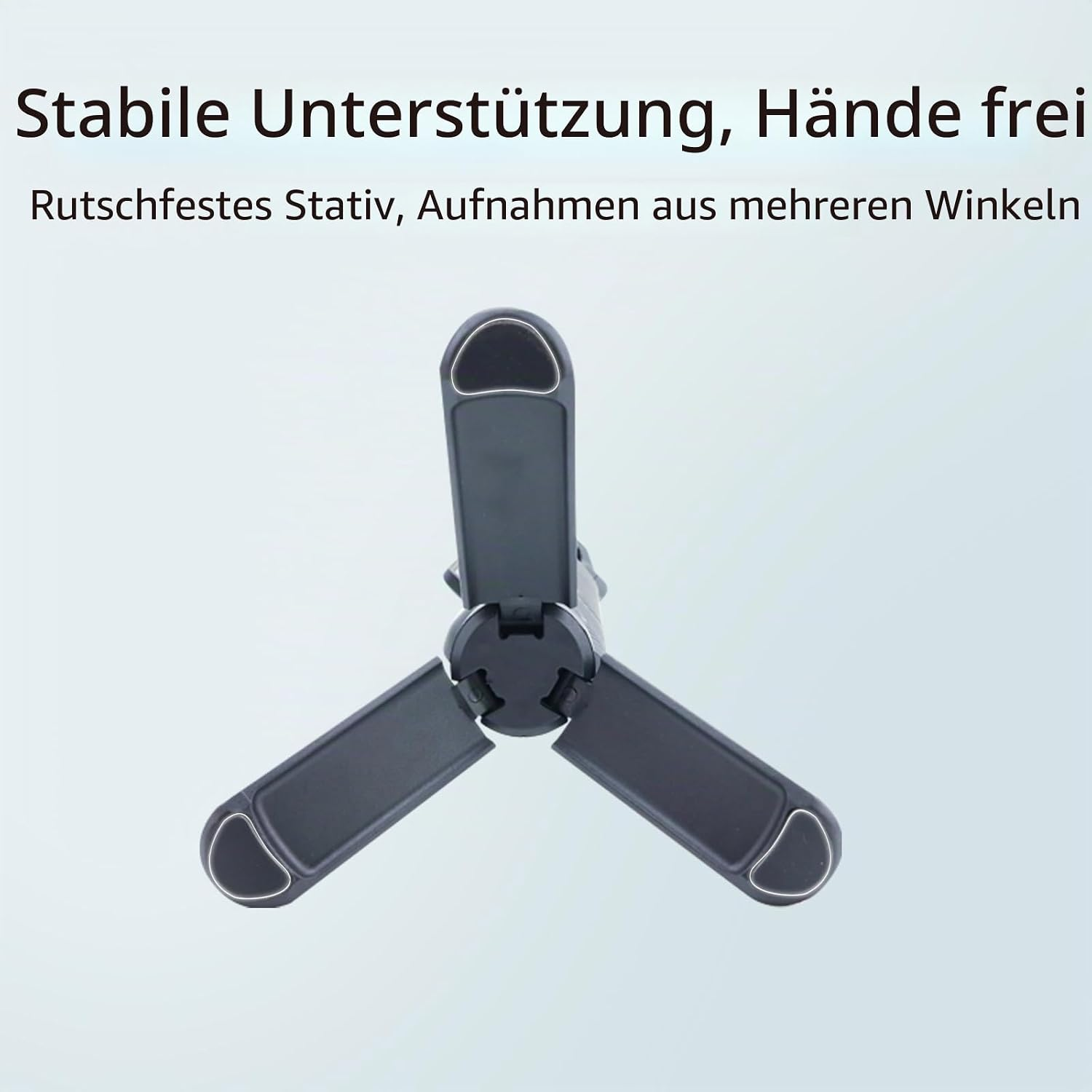 Ein kompakter, grauer Dreibein-Ständer auf hellem Hintergrund mit deutschem Text oben.