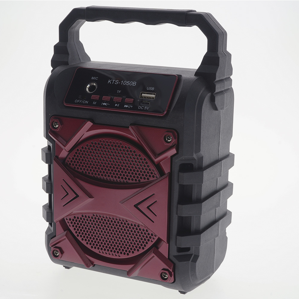 Un altoparlante Bluetooth portatile KTS-1050B nero e bordeaux con maniglia, due altoparlanti e pulsanti.