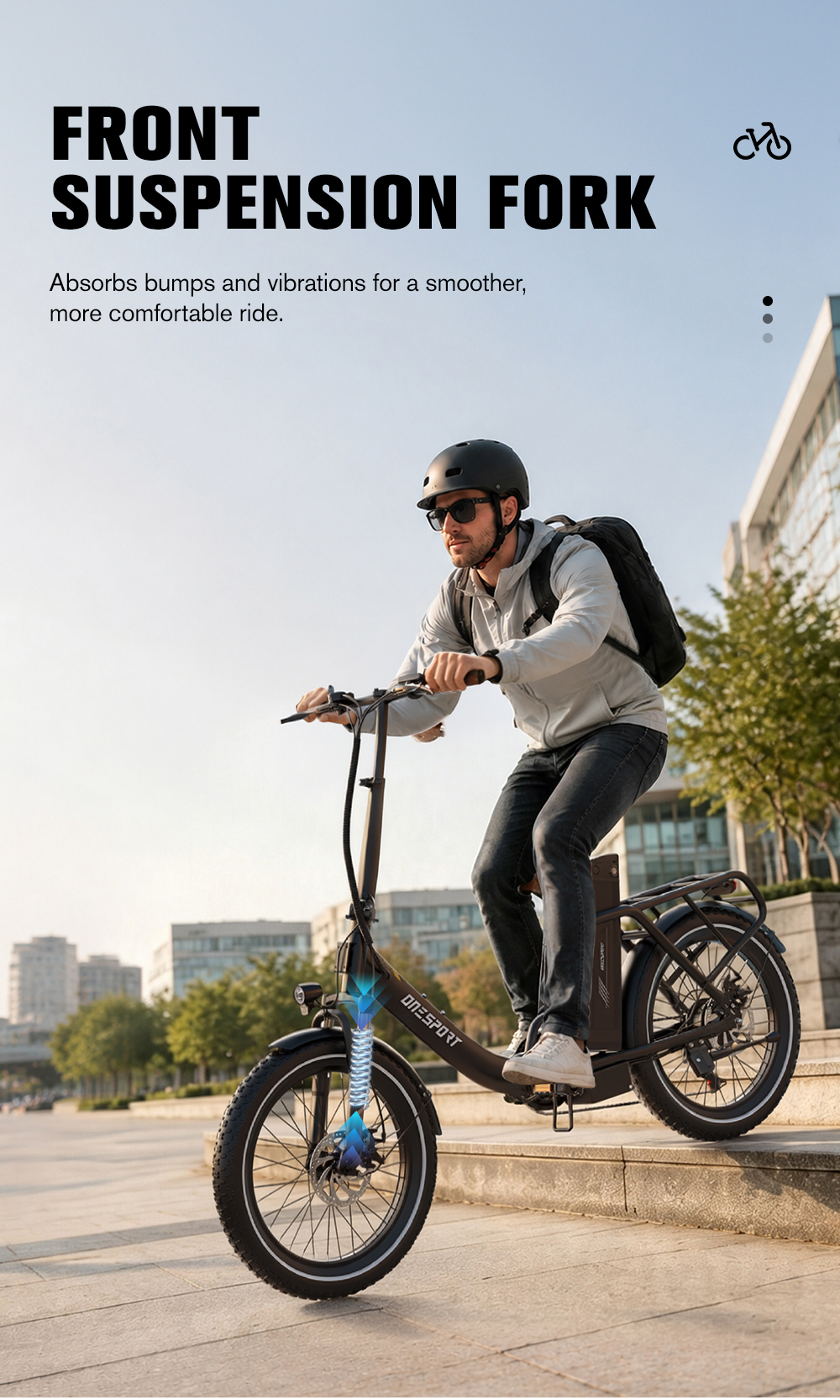 Un hombre monta en bicicleta eléctrica con suspensión delantera por escalones.
