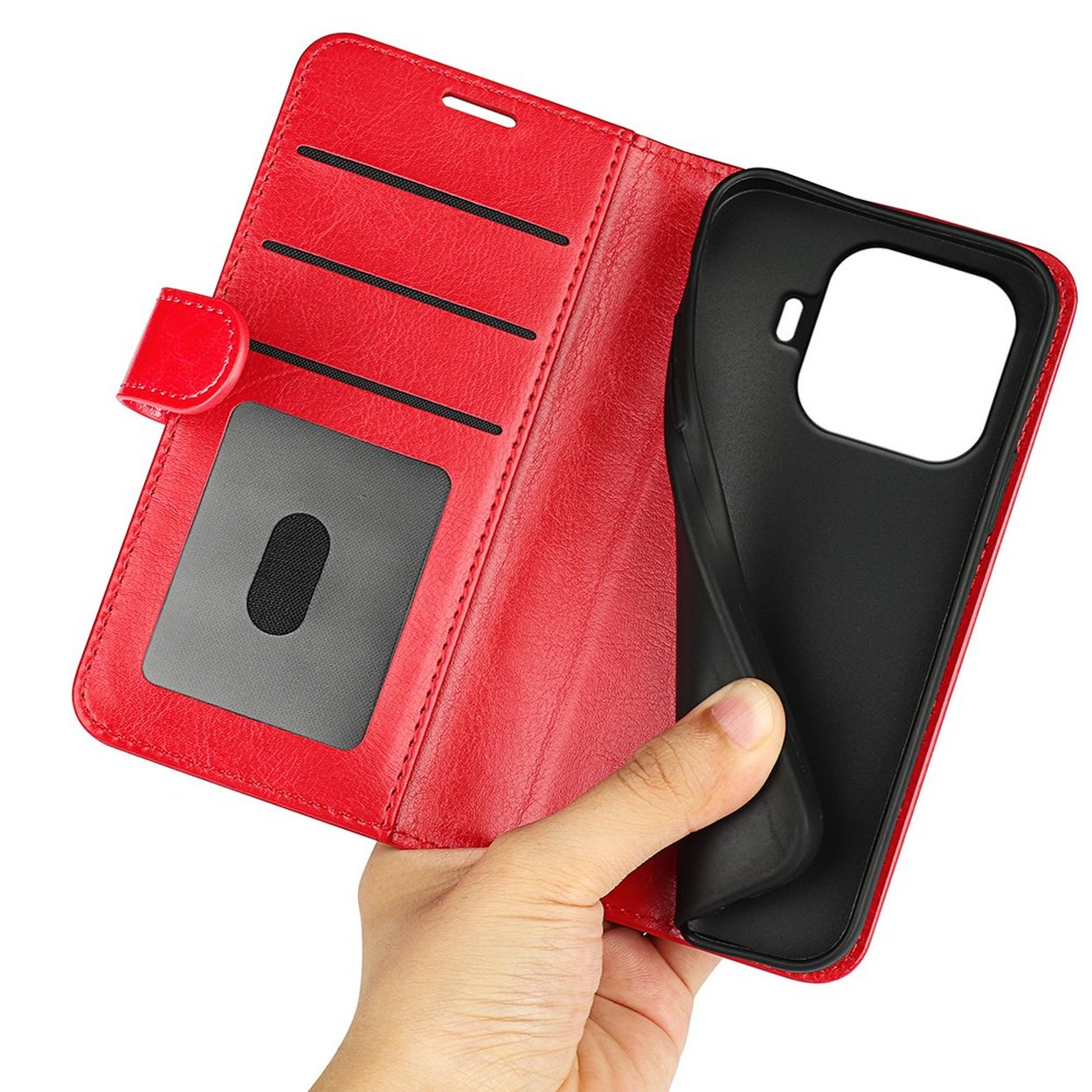 A hand holds an open red leather phone case with card slots and a black inner shell.