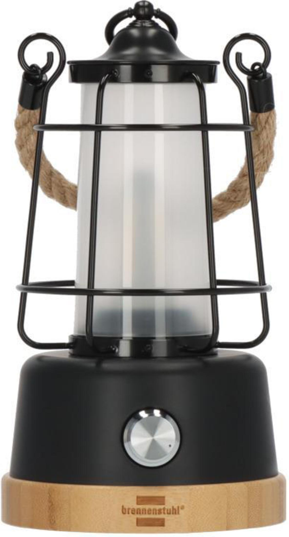 Lanterna LED nera con cilindro bianco, manico in corda, interruttore e base in legno.