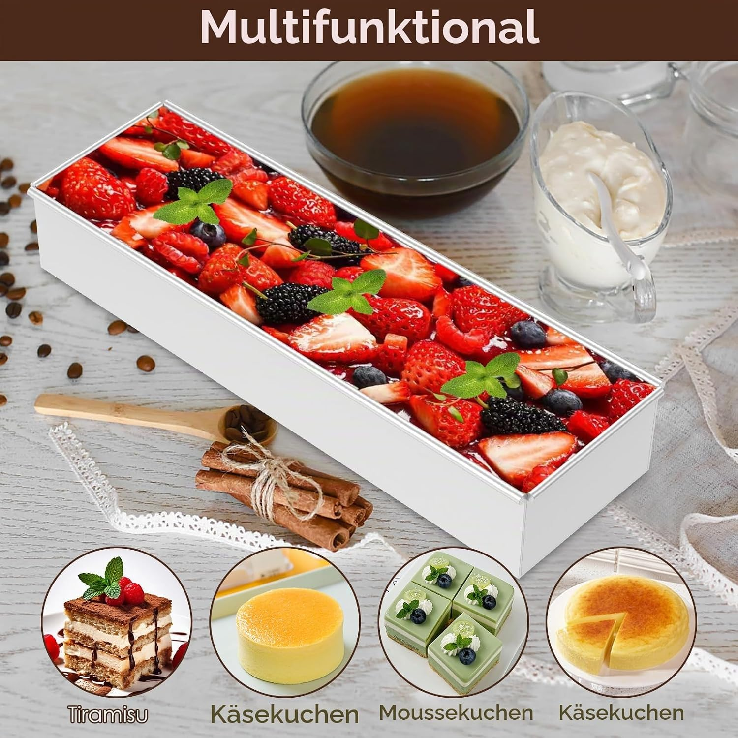 Eine rechteckige Backform voller Früchte, begleitet von Tiramisu, Käsekuchen und Moussekuchen.