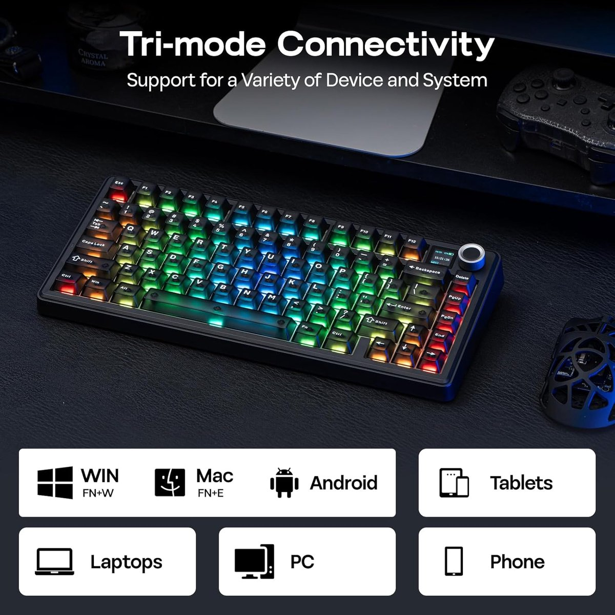 Un clavier mécanique noir avec rétroéclairage RVB est posé sur un bureau avec une souris, une manette et des icônes.
