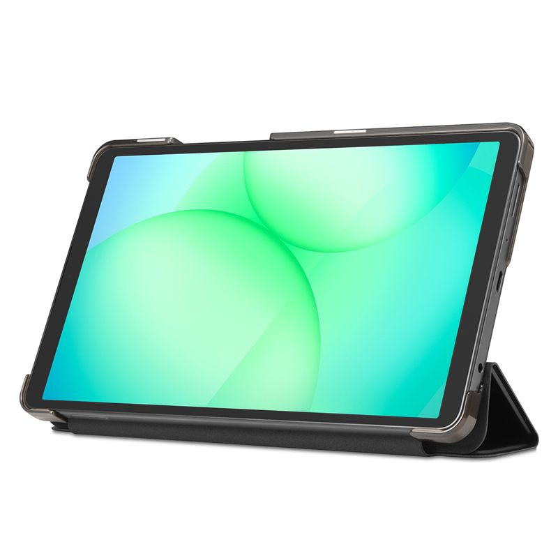 Une tablette dans une coque de protection noire sur une surface blanche affiche un design vert vif.
