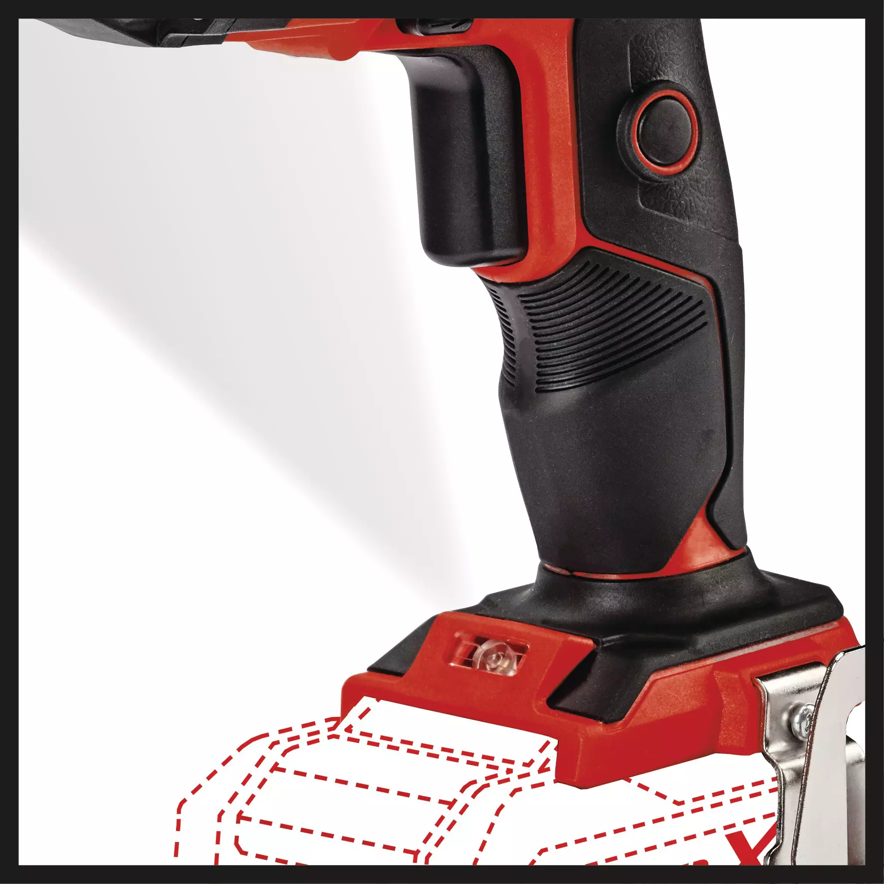 Primo piano di un trapano a batteria rosso e nero con il profilo della batteria.