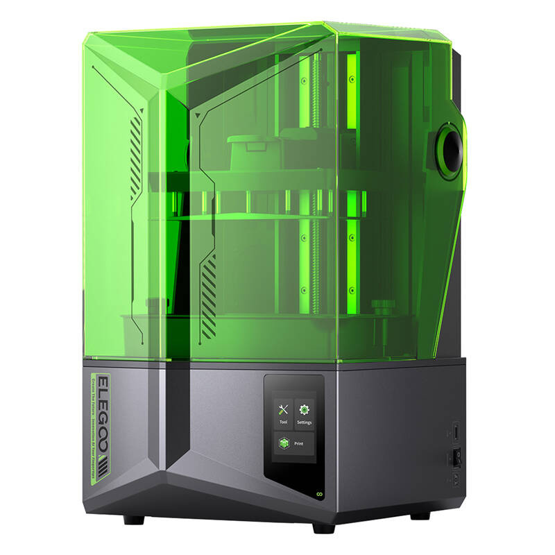 Moderna stampante 3D con coperchio protettivo verde trasparente e touchscreen sulla base grigia.