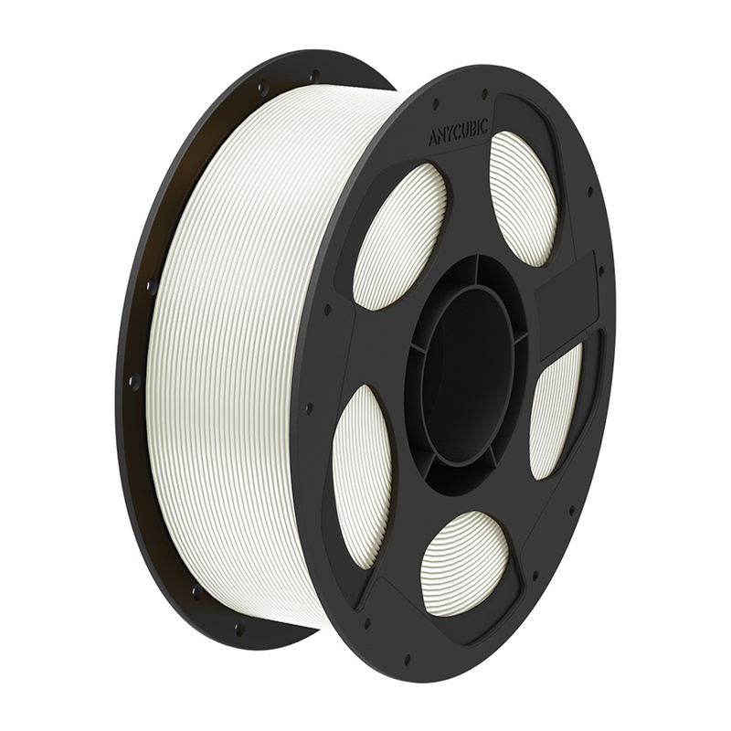 Una bobina nera di filamento bianco per stampante 3D su sfondo bianco.