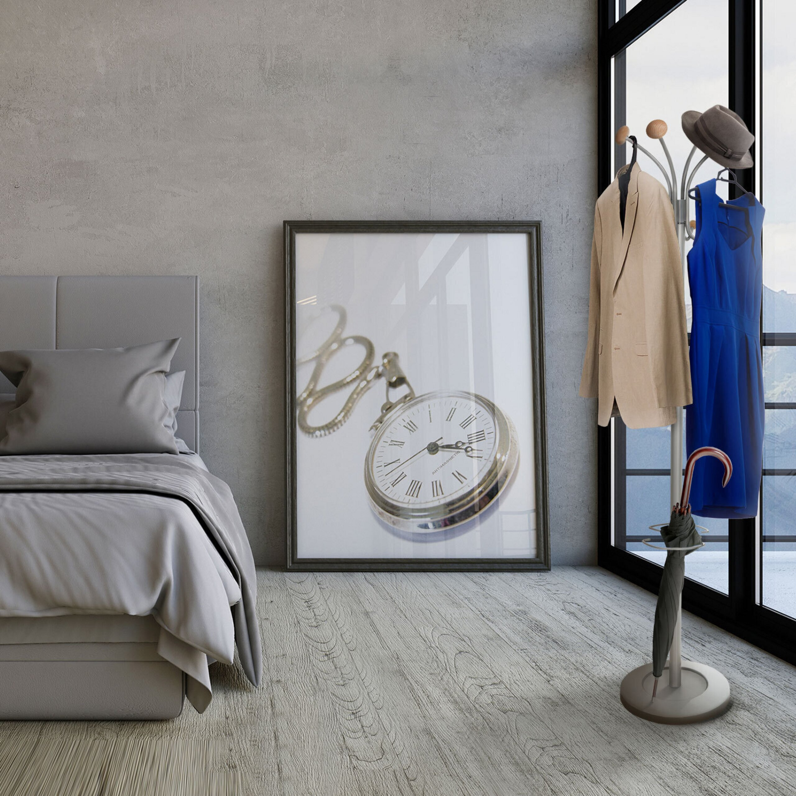 Ein Schlafzimmer mit grauem Bett, großem Taschenuhr-Bild und Kleiderständer mit Kleidung und Schirm.