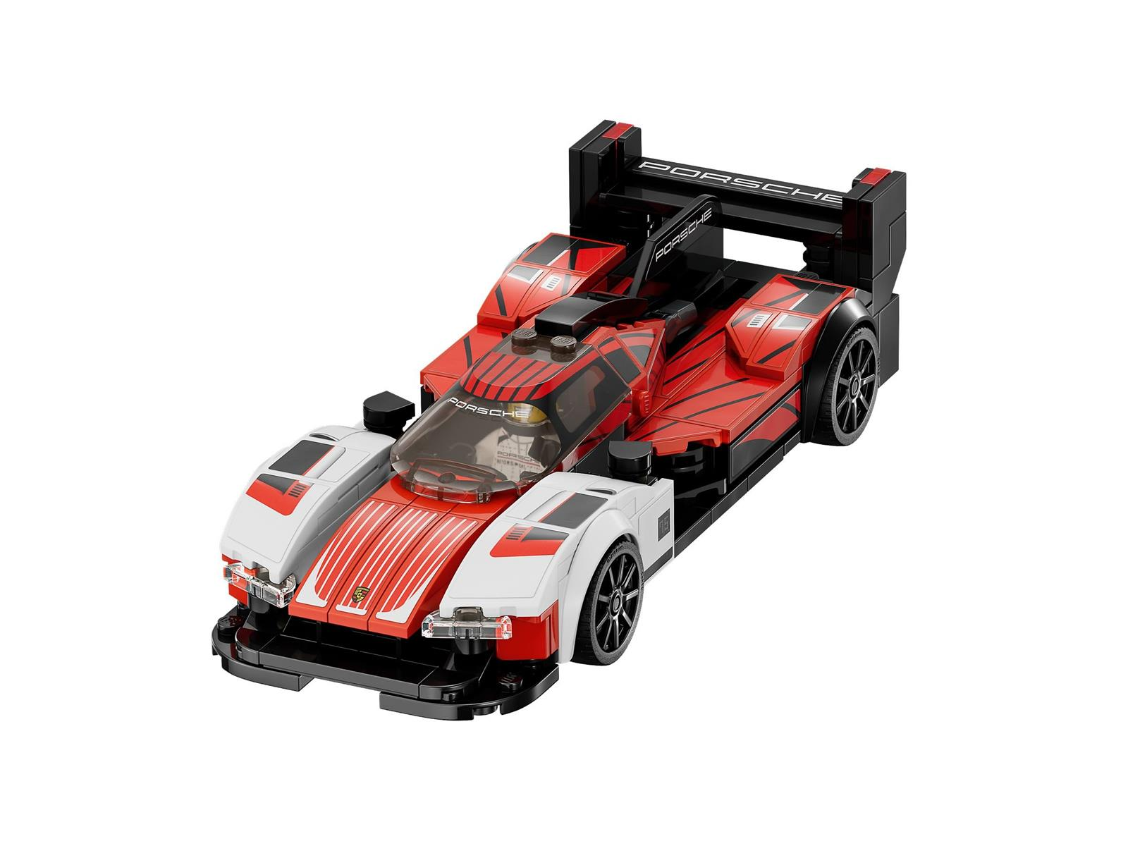 Ein rotes und weißes Lego Porsche Rennauto mit großem Heckspoiler auf weißem Hintergrund.
