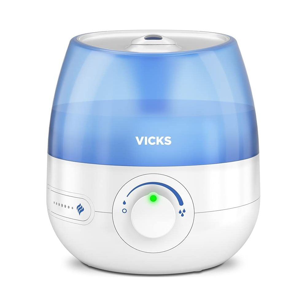 Kontrol düğmeli ve yeşil ışıklı, beyaz ve mavi Vicks nemlendirici.