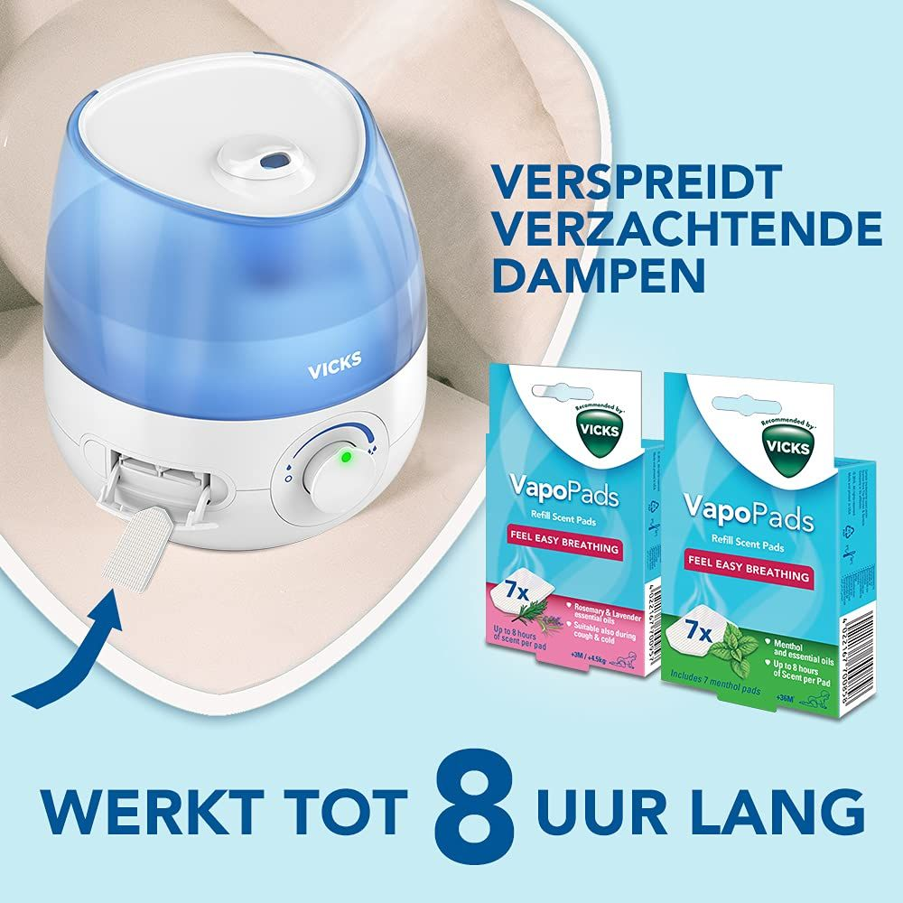 Mavi su haznesine sahip Vicks nemlendirici ve yanında iki VapoPads paketi.