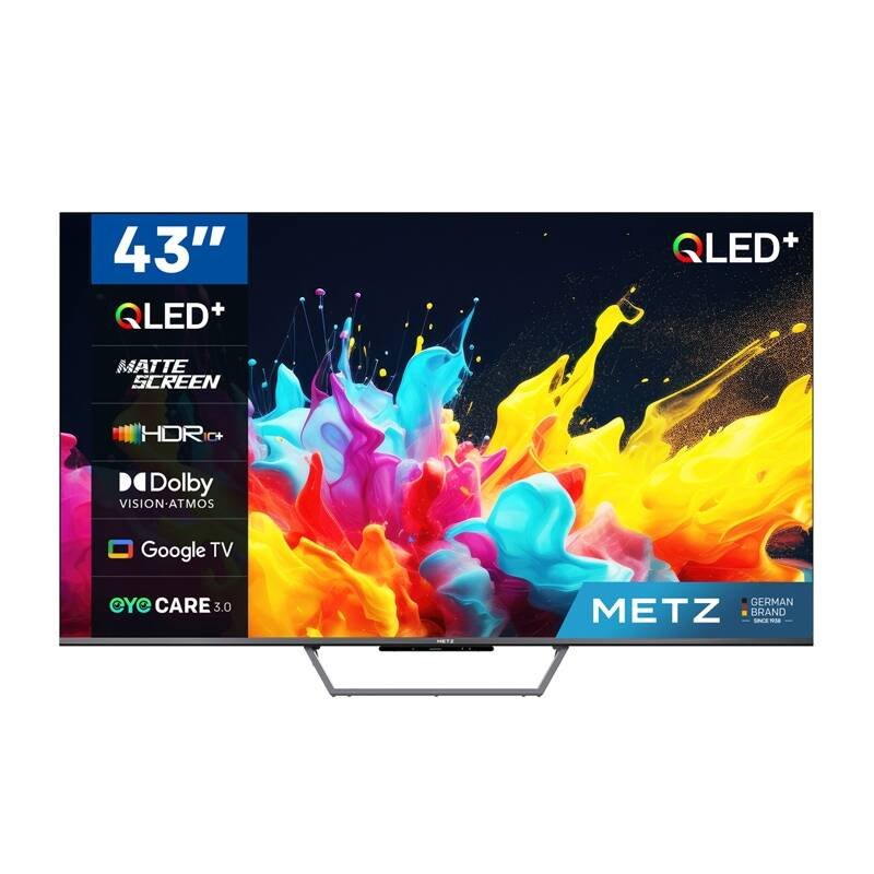 Un televisore Metz QLED+ da 43 pollici mostra un'esplosione di vernice colorata sullo schermo, su supporto.