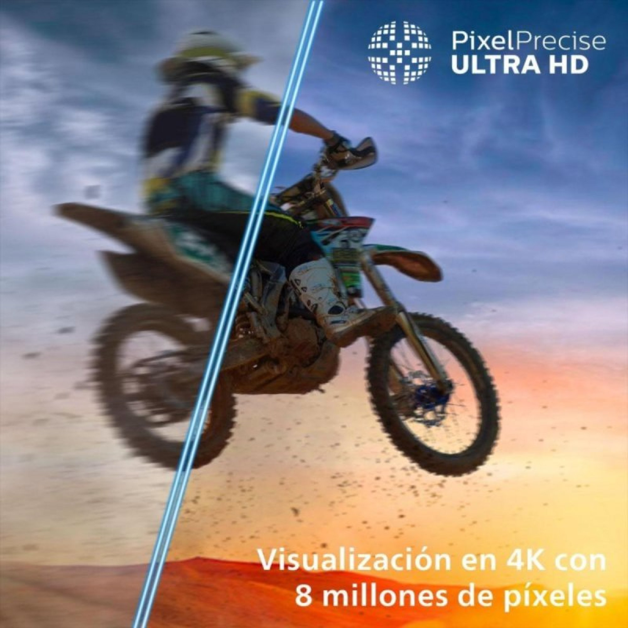 Un pilota di motocross salta in aria contro un cielo nuvoloso.