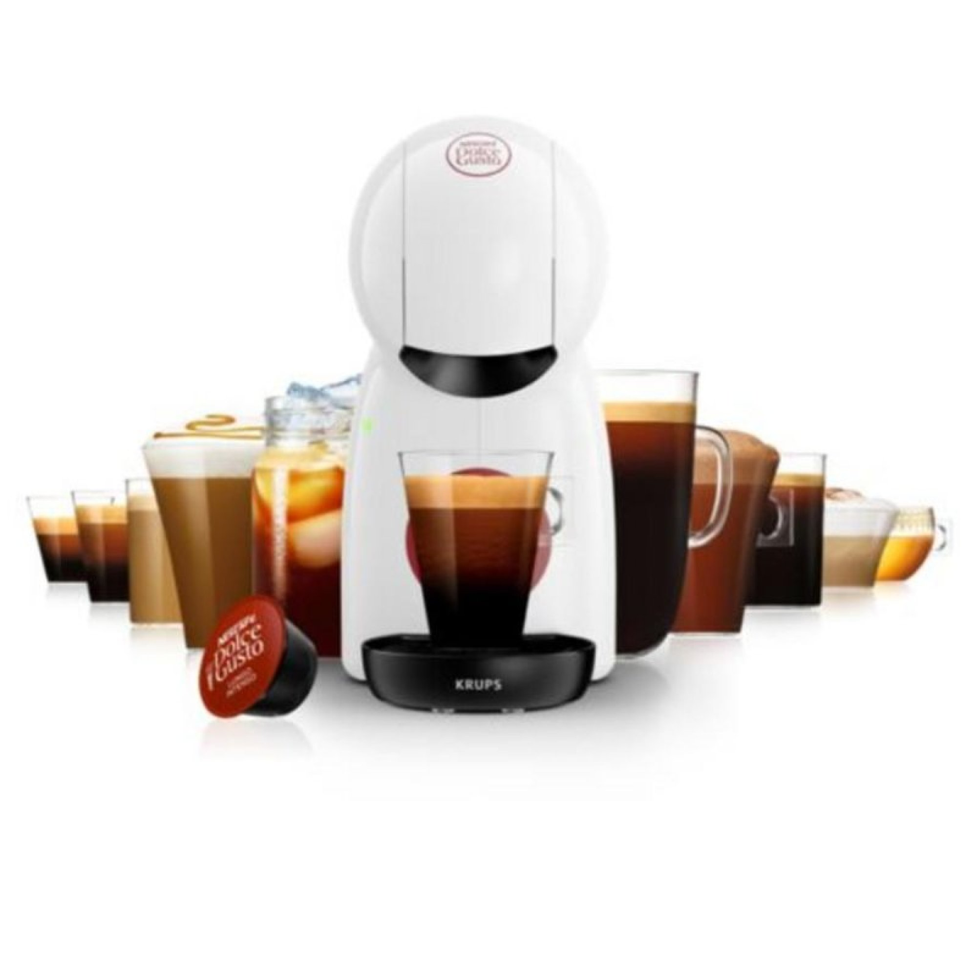 Una macchina da caffè Krups bianca circondata da varie bevande a base di caffè in bicchieri e una capsula.