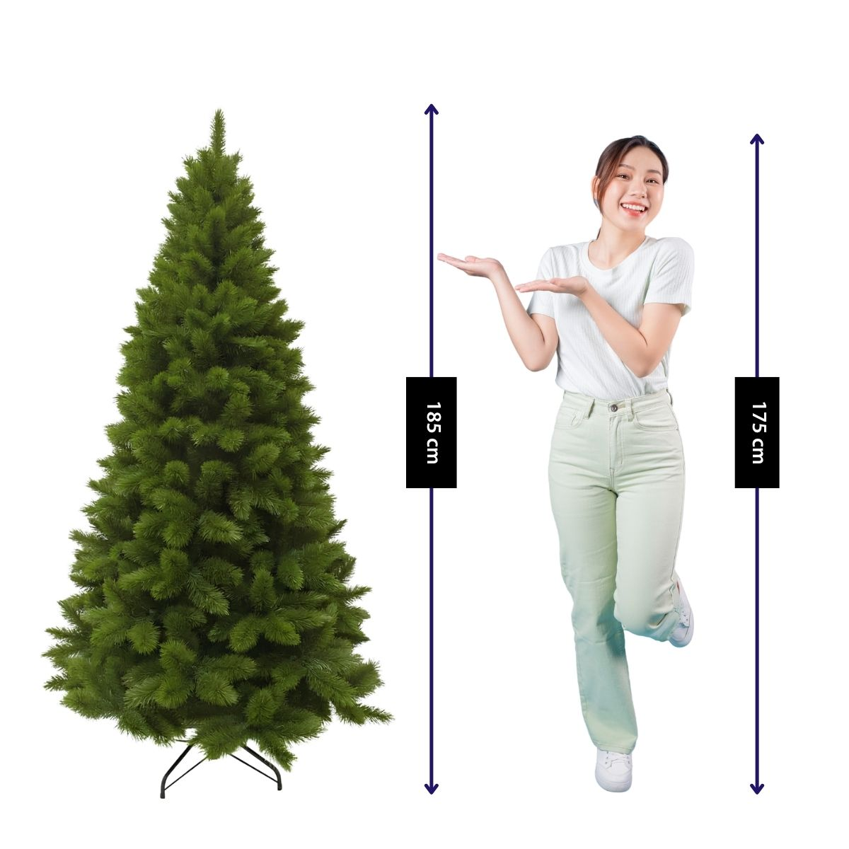 A woman points to an artificial green Christmas tree with a height of 185 cm marked next to it.