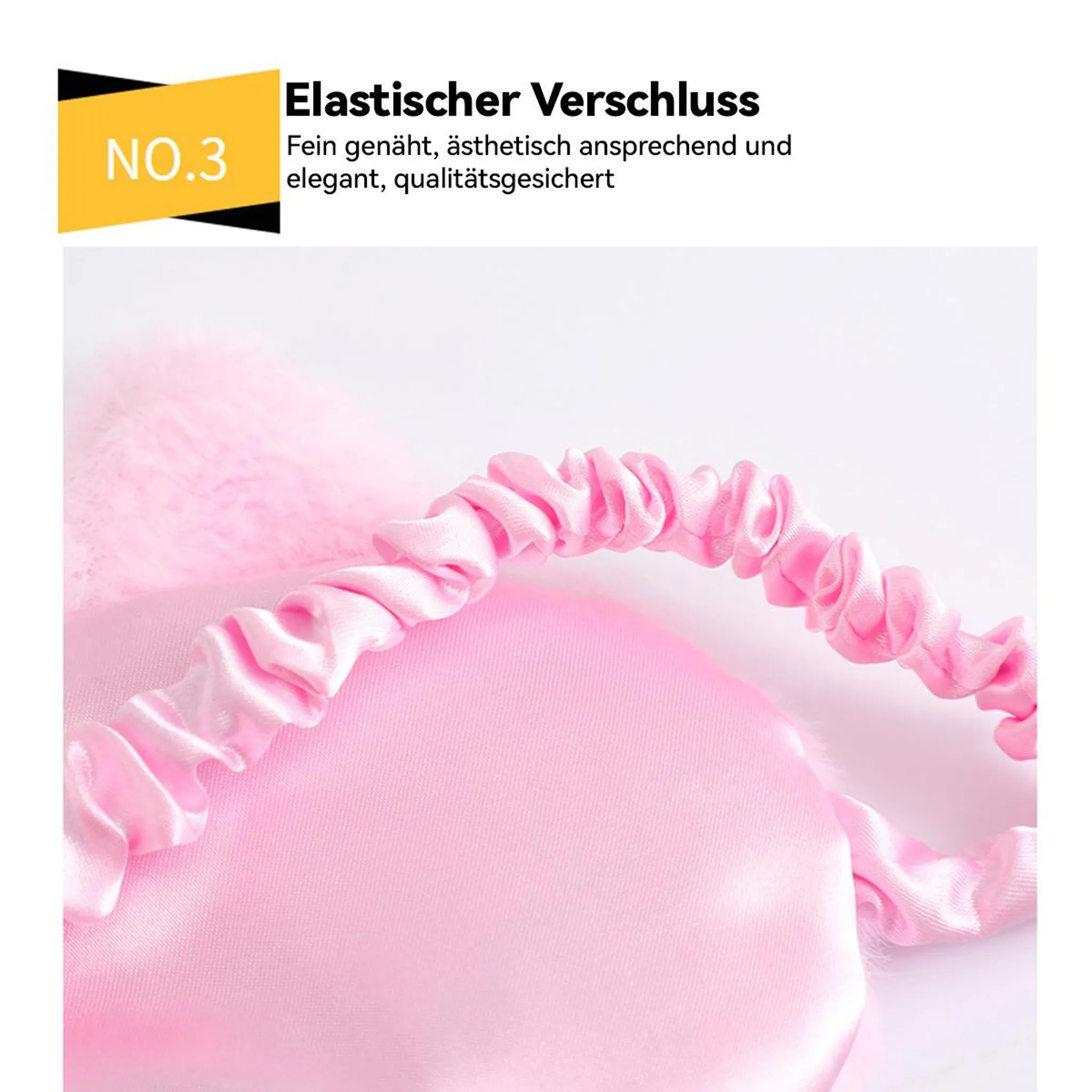 Close-up of a pink satin sleep mask with an elastic strap.