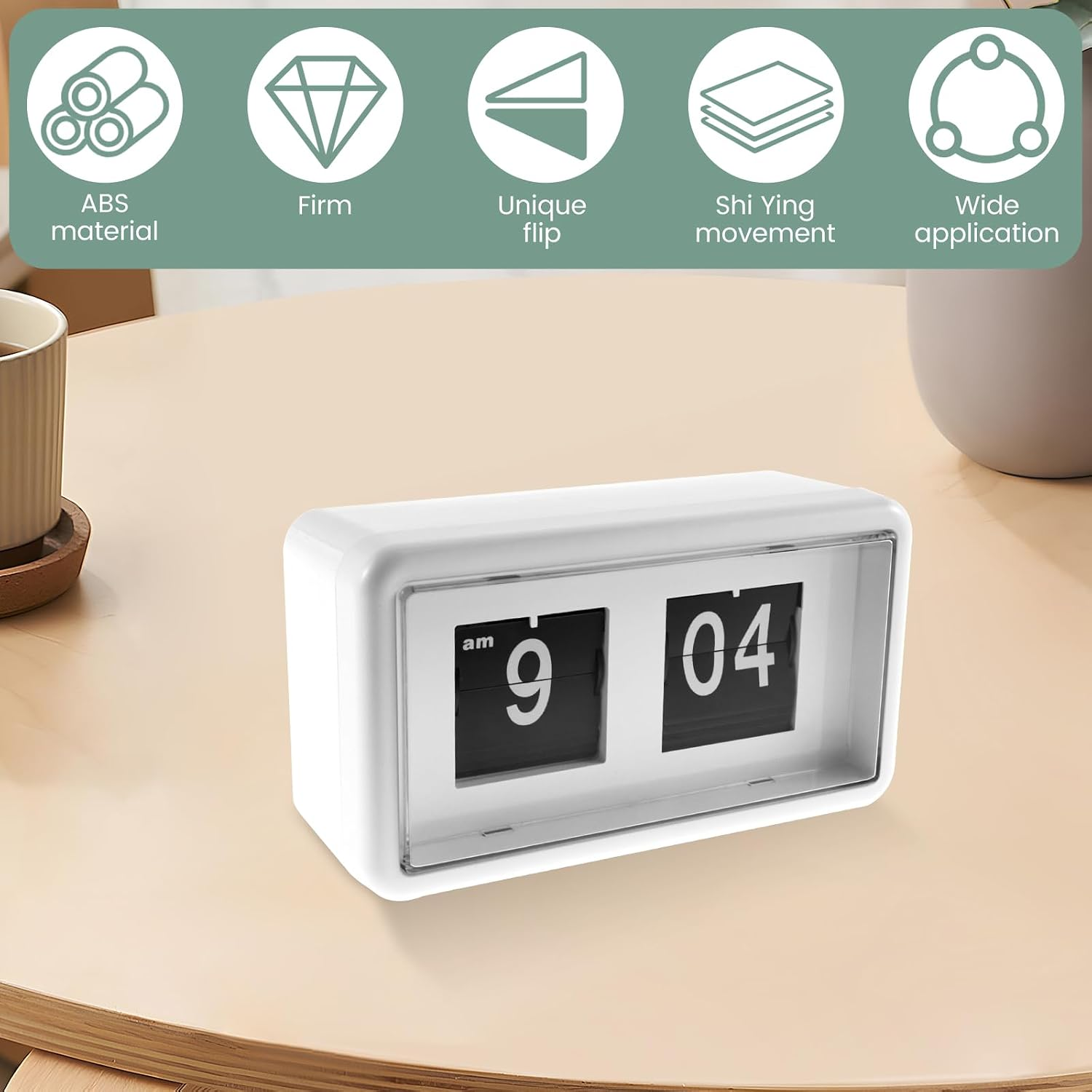 Eine weiße Retro-Flippuhr auf einem Holztisch mit Icons für Eigenschaften darüber.