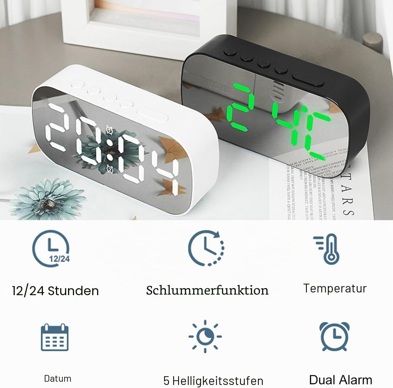 Zwei moderne Digitalwecker in Weiß und Schwarz mit LED-Anzeige und Funktionen wie Datum, Temperatur und Alarm.