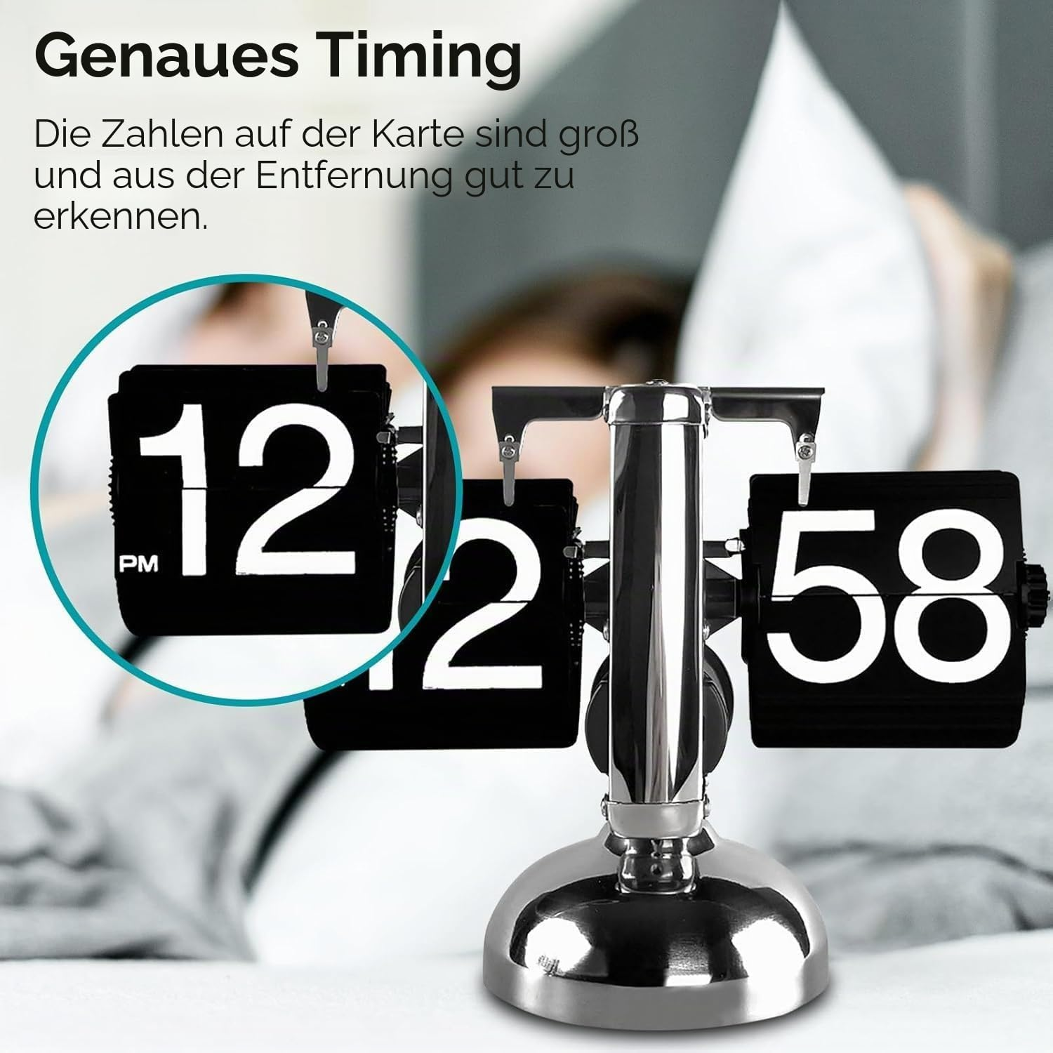 Eine Chrom-Klappzahlenuhr zeigt 12:58, mit einem vergrößerten Kreis, der die Zahl 12 hervorhebt, vor verschwommenem Hintergrund.