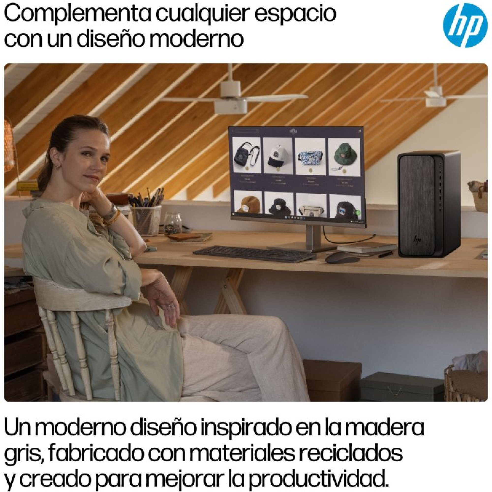 Una donna siede a una scrivania con computer HP, monitor e testo in alto.