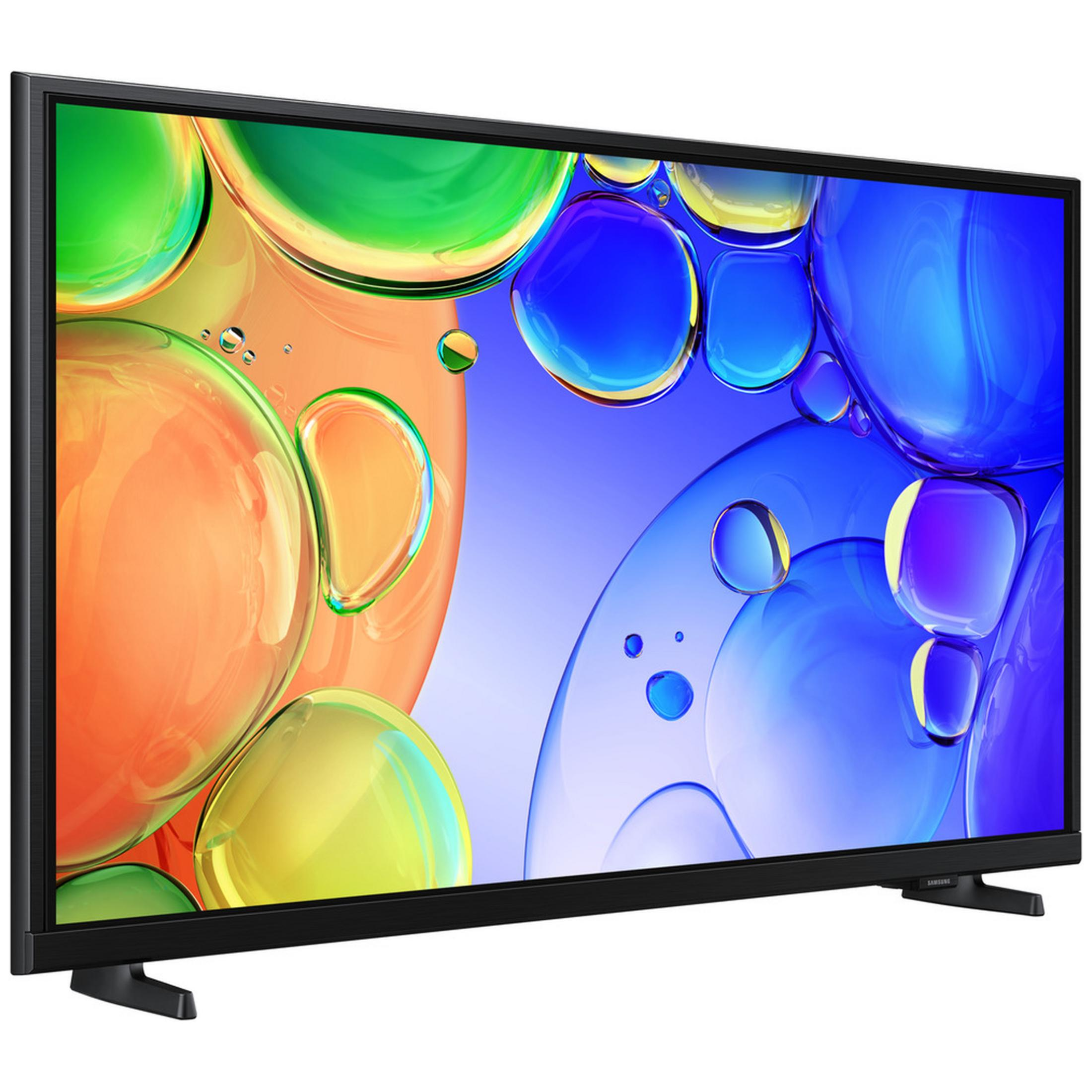 Una TV a schermo piatto nera mostra uno sfondo astratto di sfere colorate simili a bolle in blu, verde e arancione.