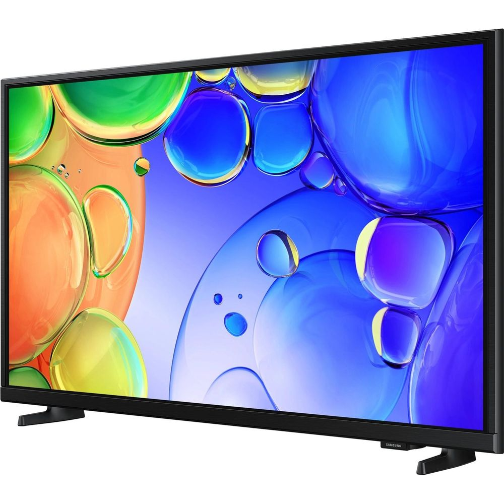 Una TV moderna con cornice nera mostra un motivo astratto e colorato di bolle sullo schermo.