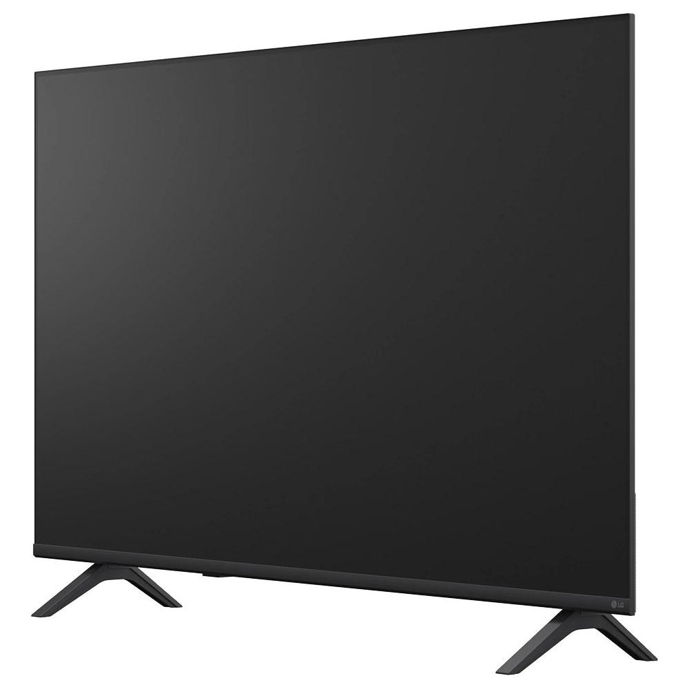 Un televisore LG nero con una cornice sottile poggia su due gambe a V su sfondo chiaro.