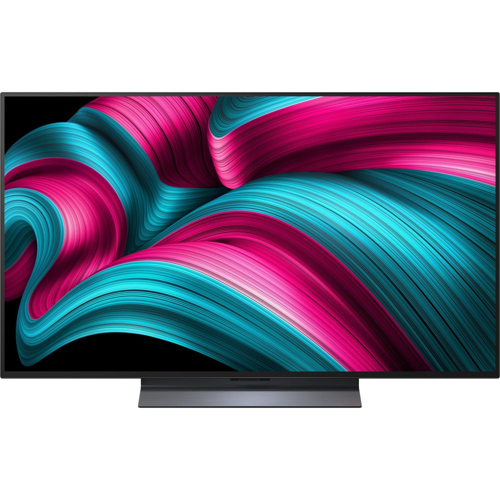 Ein Flachbildfernseher mit einem abstrakten Design aus rosa und türkisfarbenen Linien.