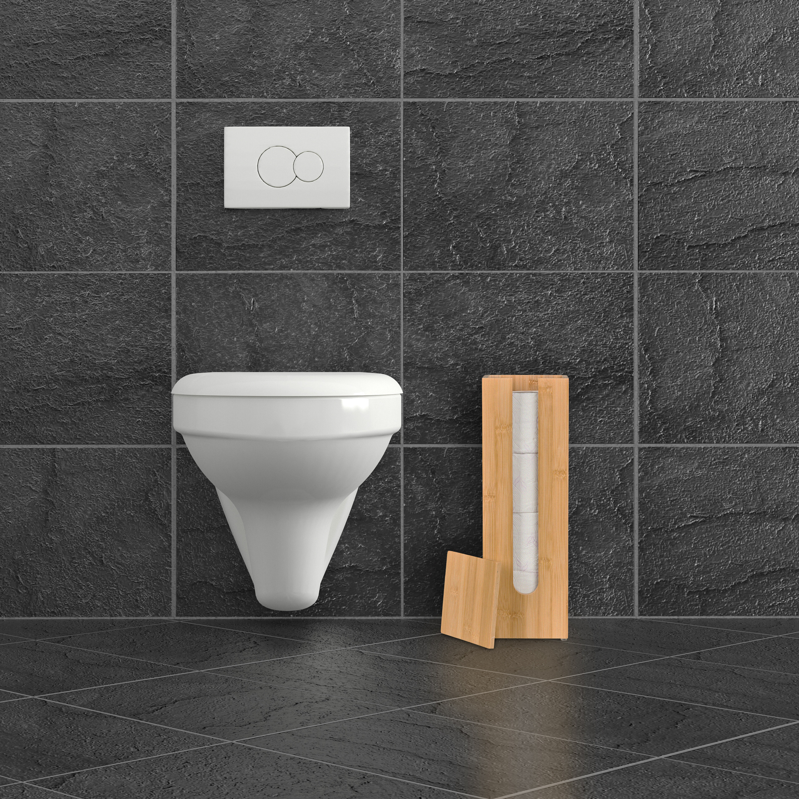 Eine weiße Hänge-Toilette und ein Bambus-Toilettenpapierhalter auf dunkelgrauen Fliesen.