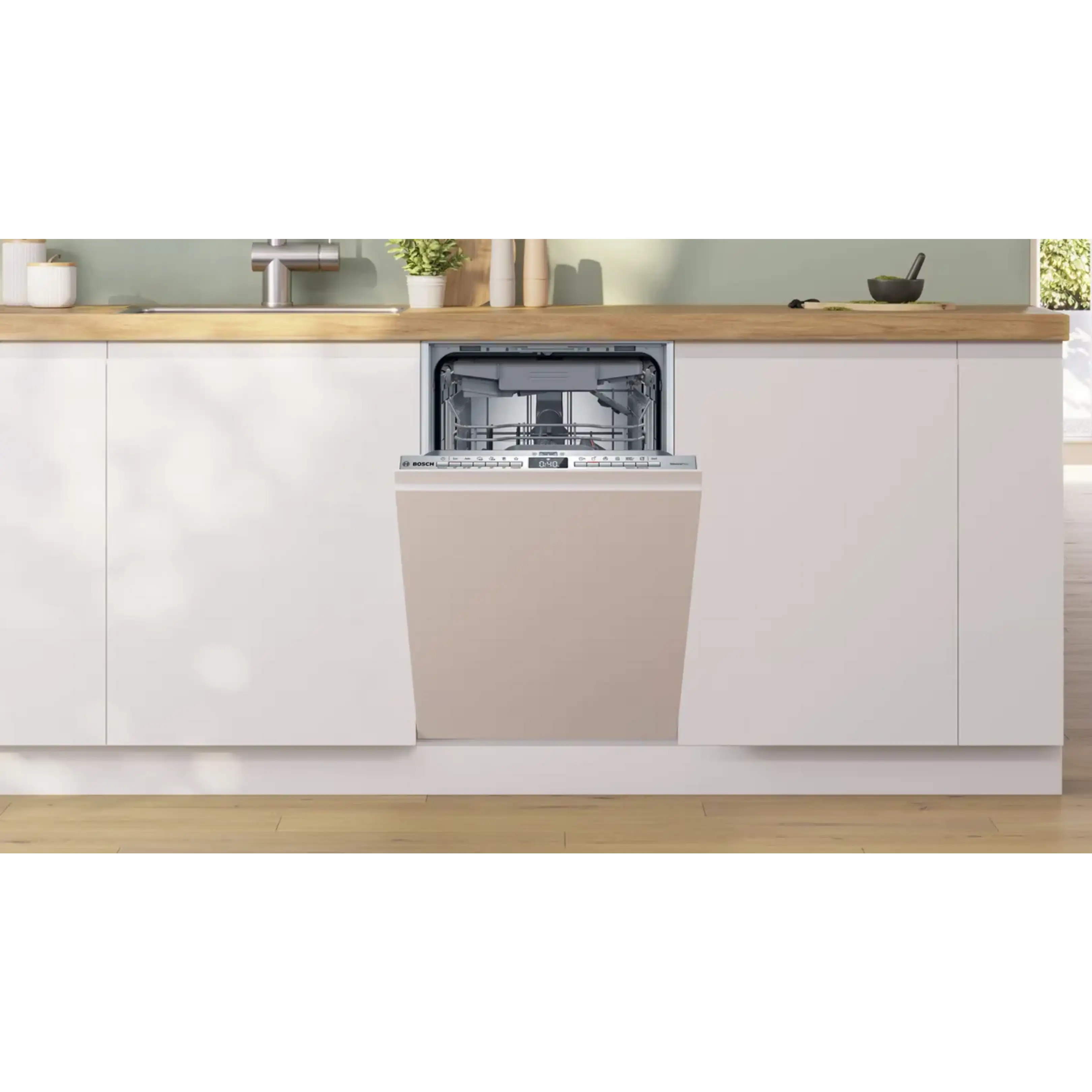 Una lavastoviglie Bosch integrata in una cucina moderna con mobili bianchi e piano di lavoro in legno.