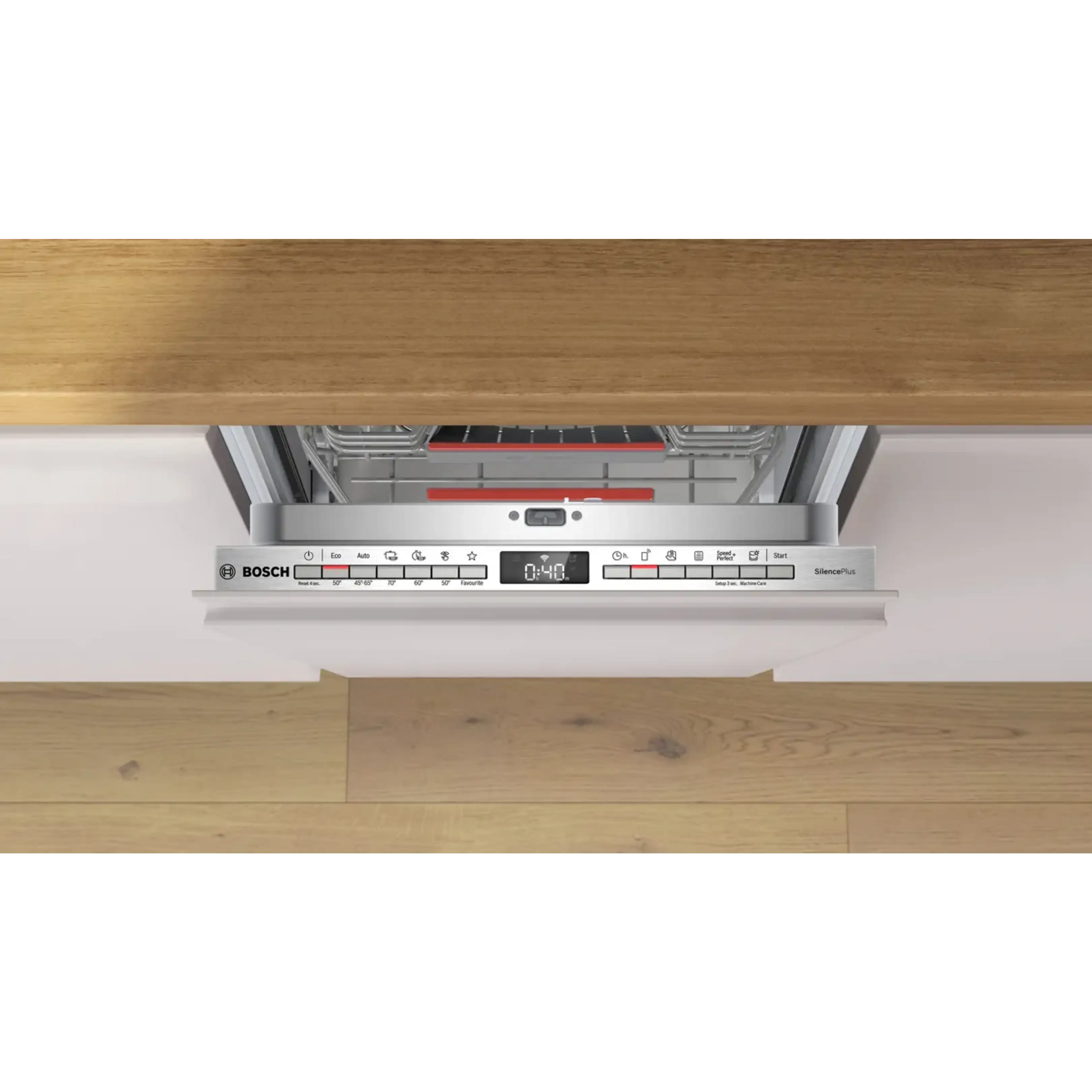 Lavastoviglie da incasso Bosch con porta aperta e display digitale sotto il piano di lavoro.