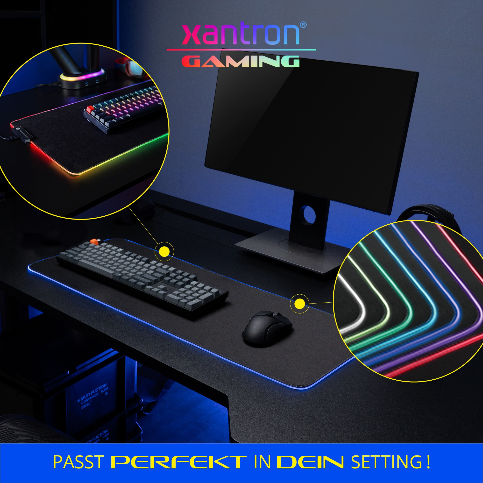 Ein Gaming-Schreibtisch mit Monitor, beleuchteter Tastatur, Maus und RGB-Mauspad.