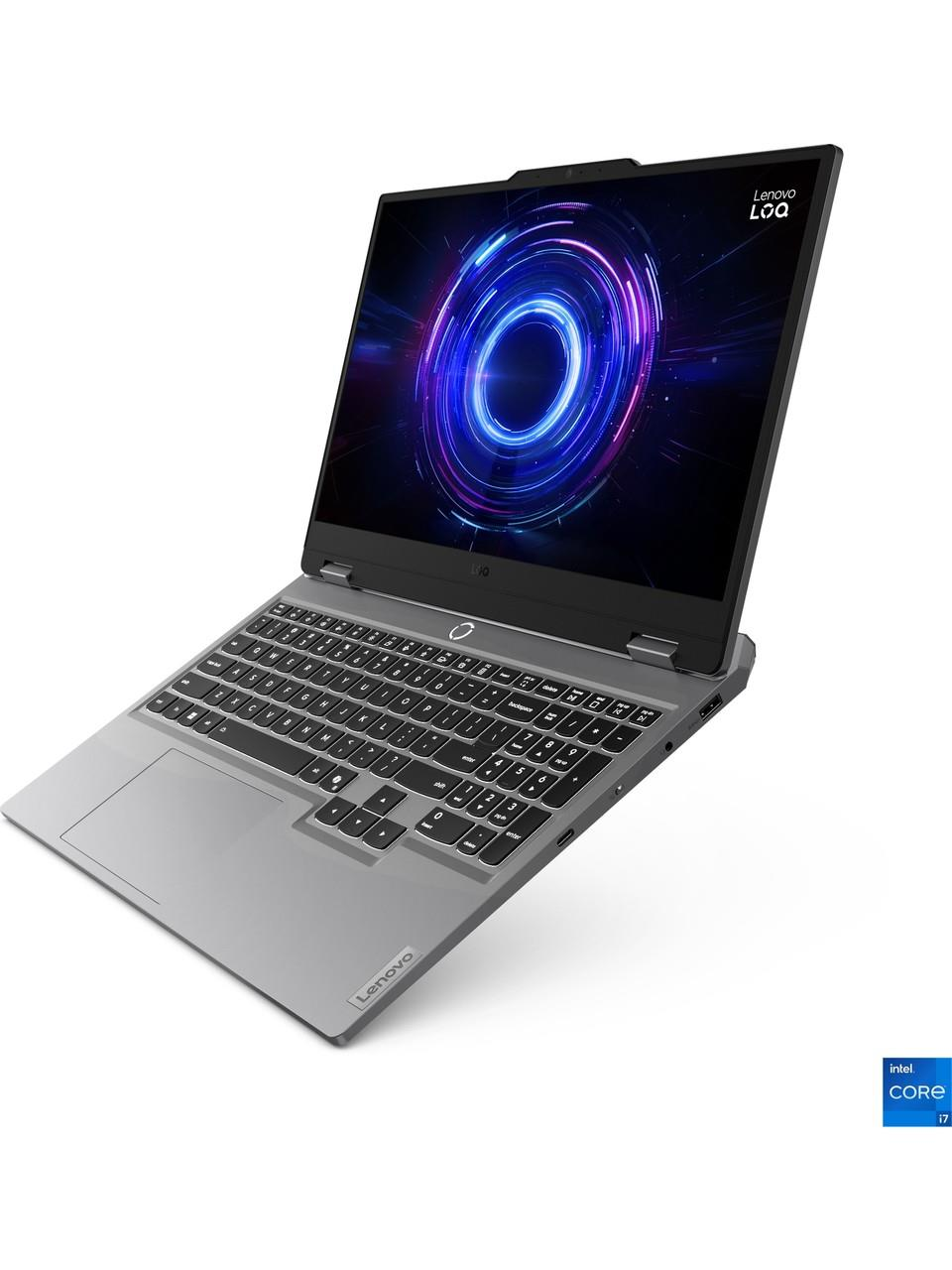 Arkadan aydınlatmalı klavyeye ve mavi soyut duvar kağıdına sahip gümüş renkli Lenovo LOQ dizüstü bilgisayar.