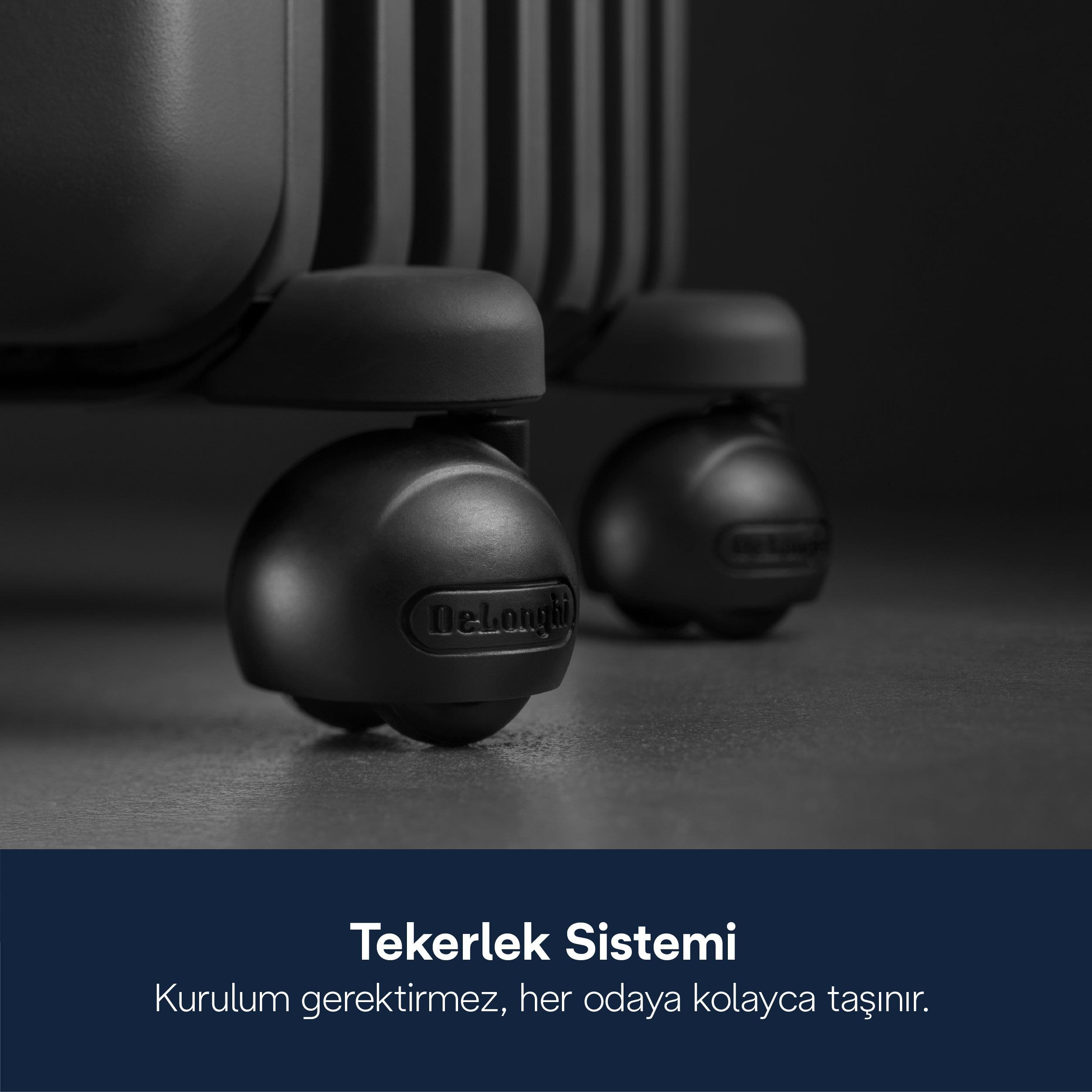 Koyu zemin üzerinde bir cihazın iki siyah DeLonghi tekerleğinin yakın çekimi.
