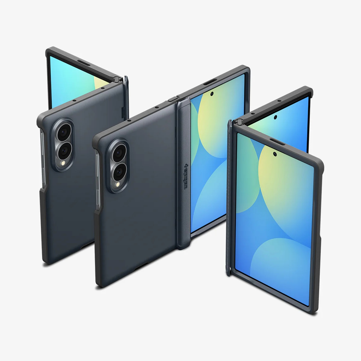 Trois smartphones pliables gris foncé présentés sous différents angles de dépliage sur fond blanc.
