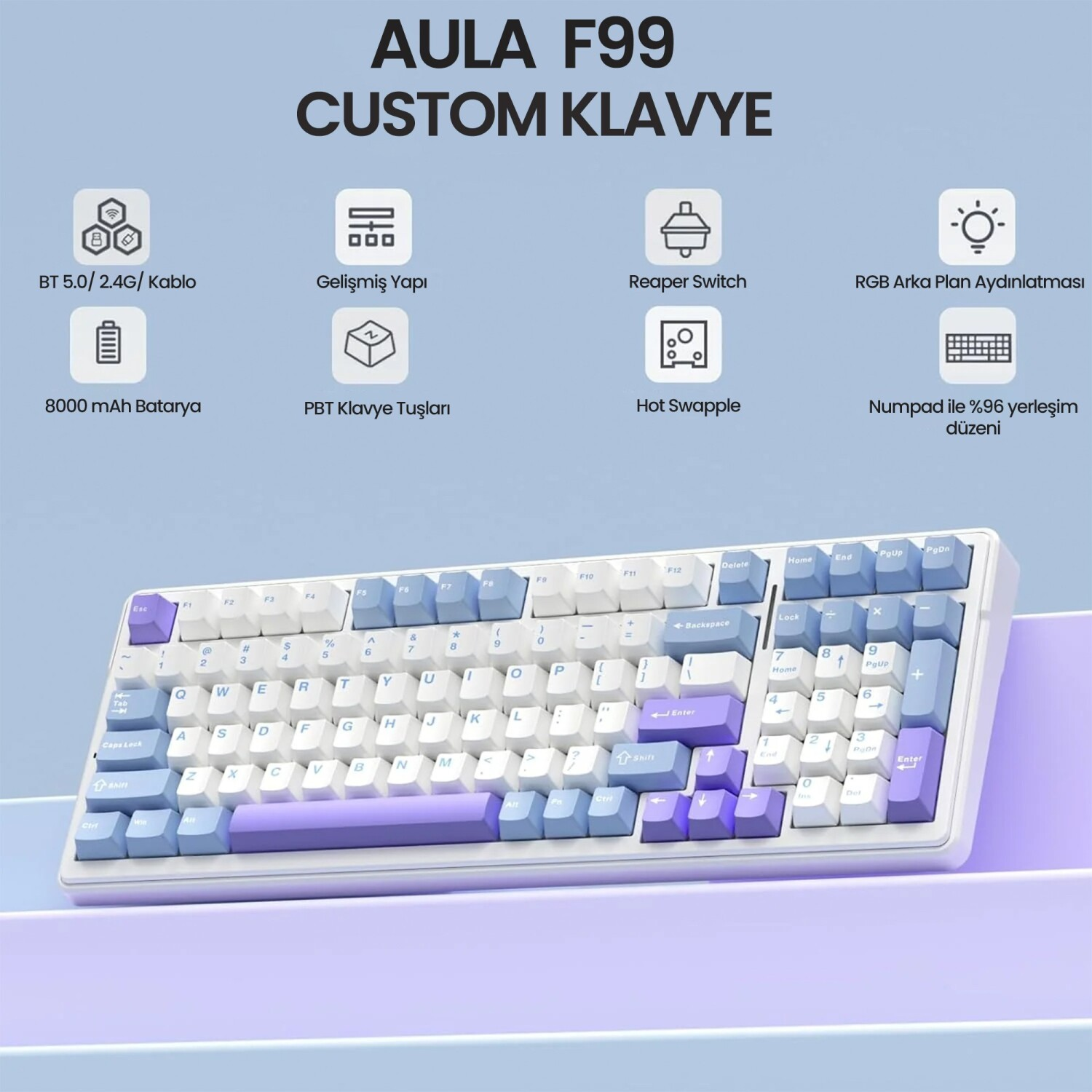 Mavi, mor ve beyaz tuşlara sahip AULA F99 özel mekanik klavye, açık mavi arka plan önünde sergileniyor.